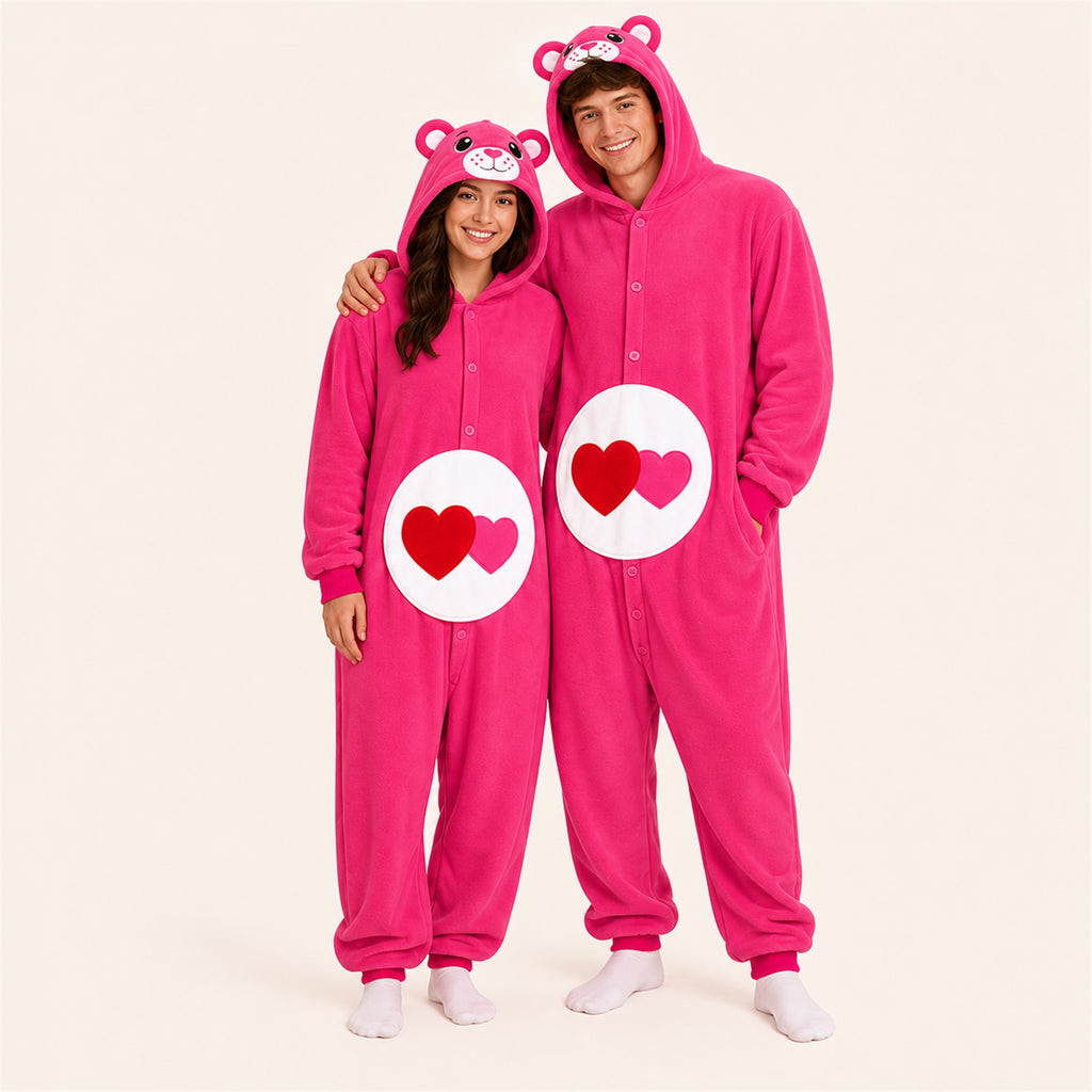 Two people wearing matching Heart Pink icon bear kigurumi onesies