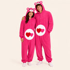 Two people wearing matching Heart Pink icon bear kigurumi onesies