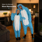 Two people wearing shark kigurumi onesies at home