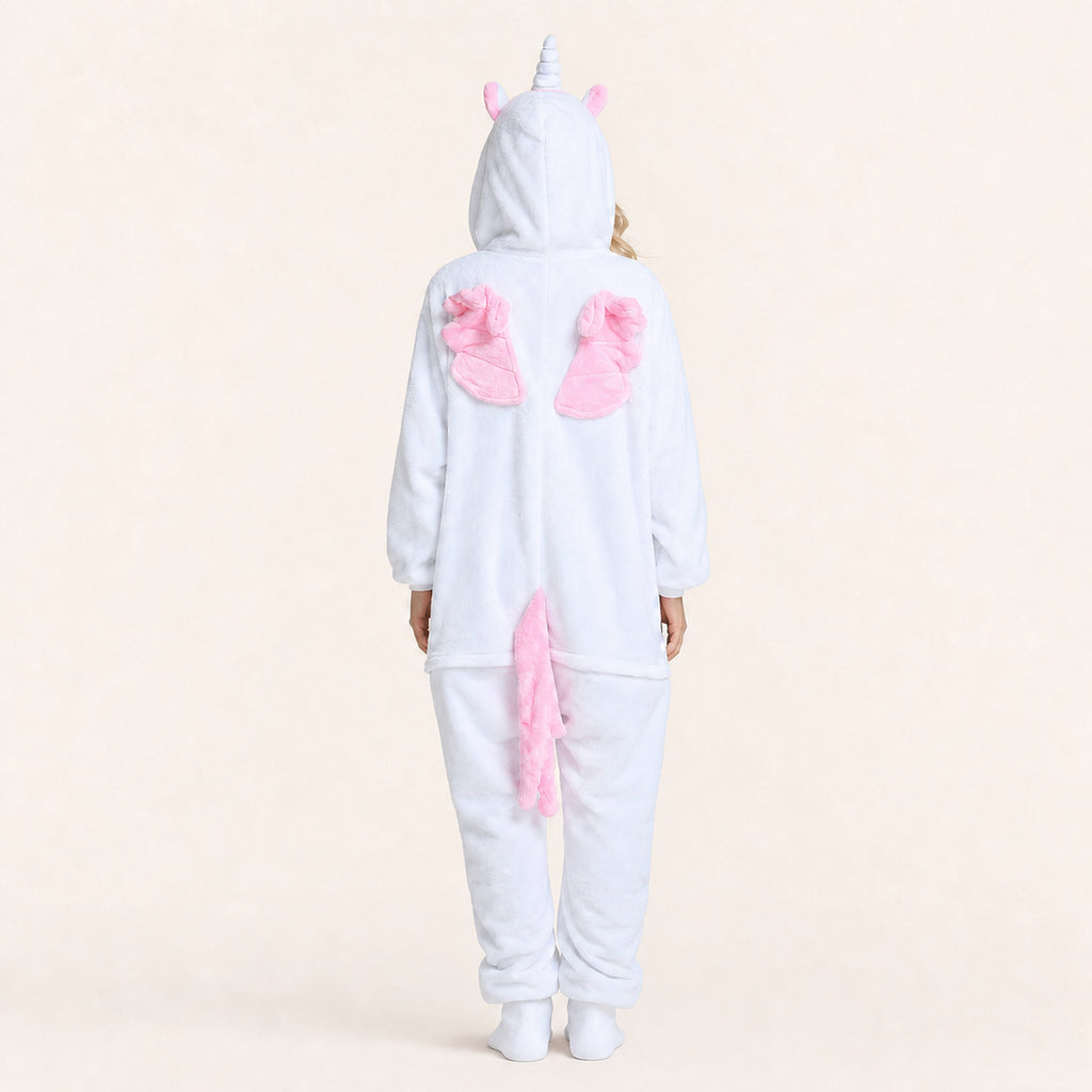 Pink wings and tail detail on white unicorn onesie