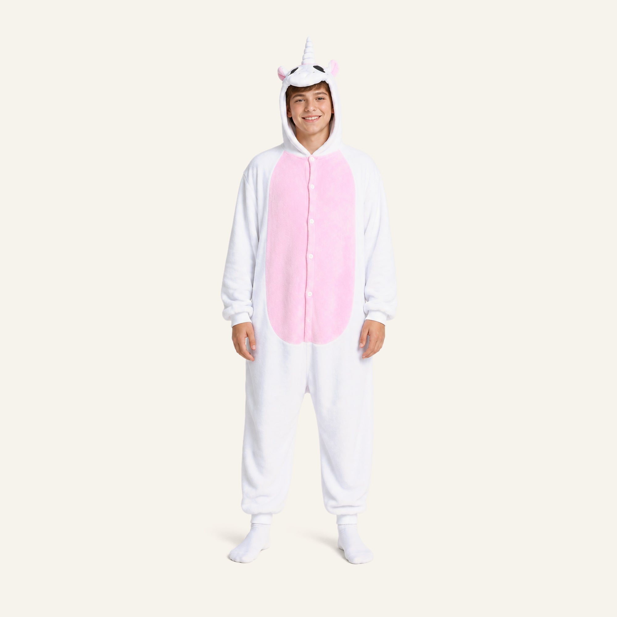 Older child wearing white unicorn onesie