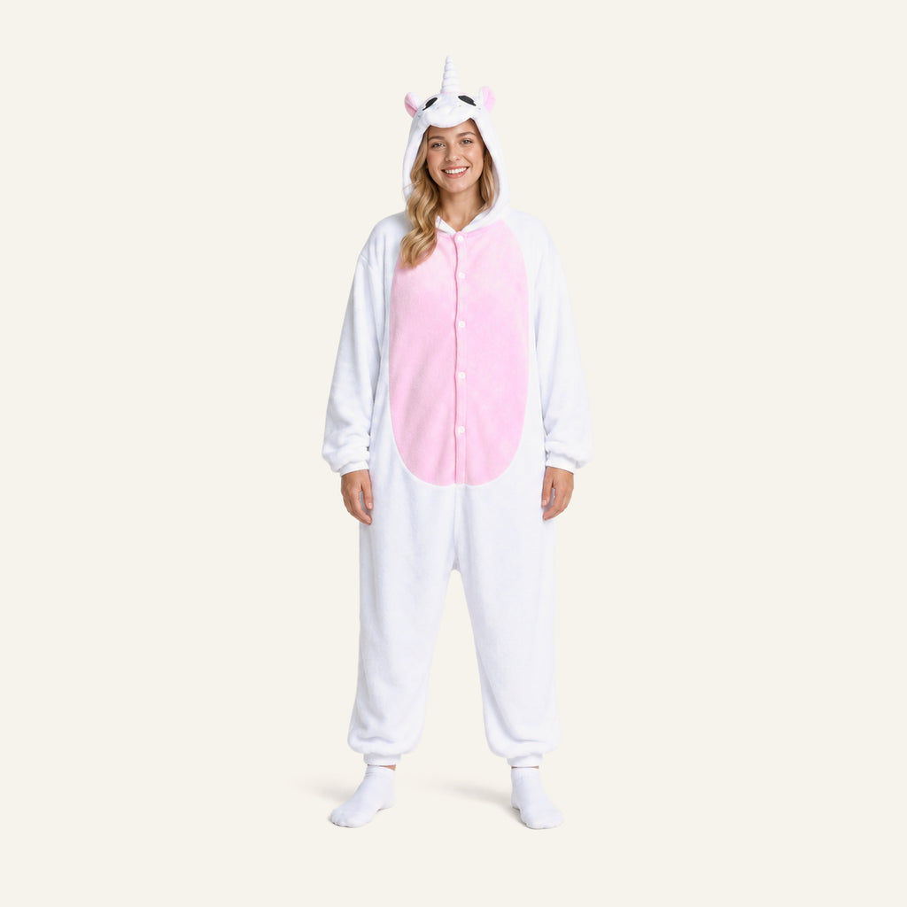 Adult woman wearing white unicorn onesie