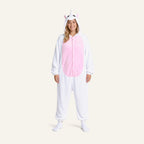 Adult woman wearing white unicorn onesie