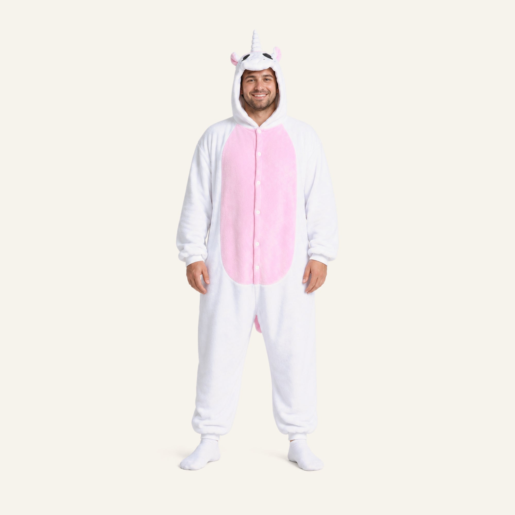 Adult man wearing white unicorn onesie